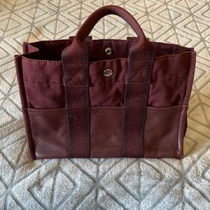 Great Hermes burgundy bag.  Authentic by Posh.